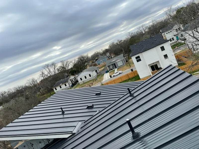 Standing seam metal roof panels with vents for Skylight Repair in Carpentersville